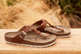 Load image into Gallery viewer, BIRKENSTOCK GIZEH BRAIDED LEATHER | COGNAC