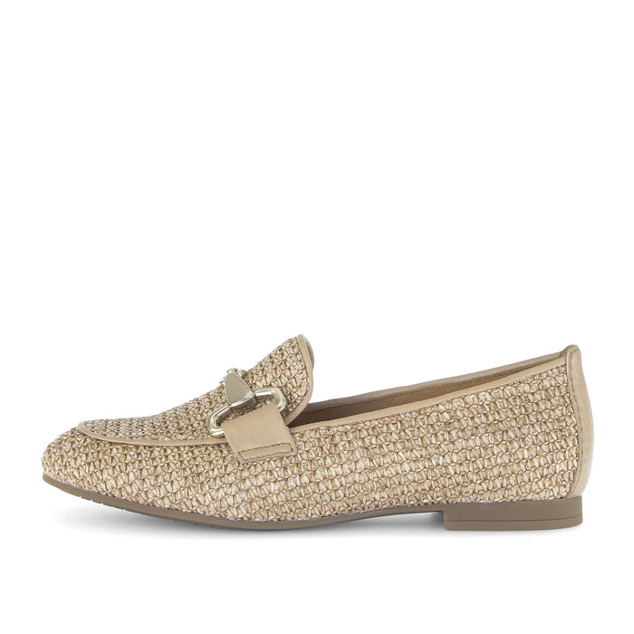 Beige textured loafer with a buckle on a white background